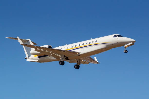 Moscow, Russia - April 03, 2019: Aircraft Embraer EMB-135BJ Legacy OE-LLG of MJet airline going to landing against blue sky at Vnukovo international airport in Moscow at sunny day