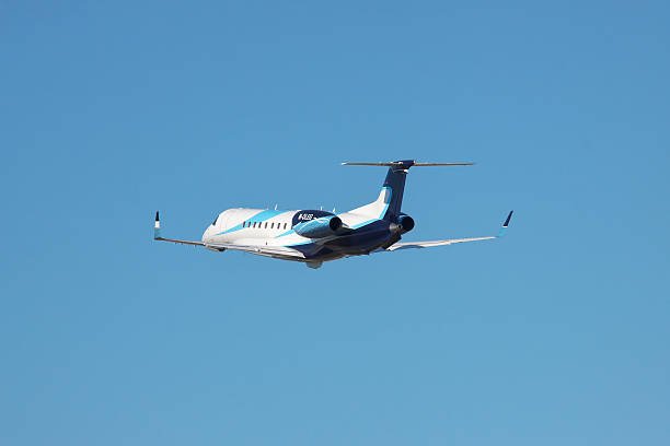 Simferopol, Ukraine - September 12, 2010: Embraer EMB-135BJ business jet is taking off from with its gear already retracted